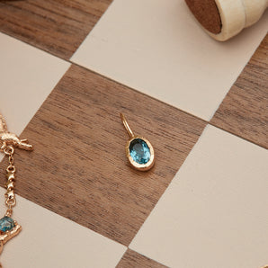 Oval Blue Topaz Gold Pendant | LOVE BY THE MOON
